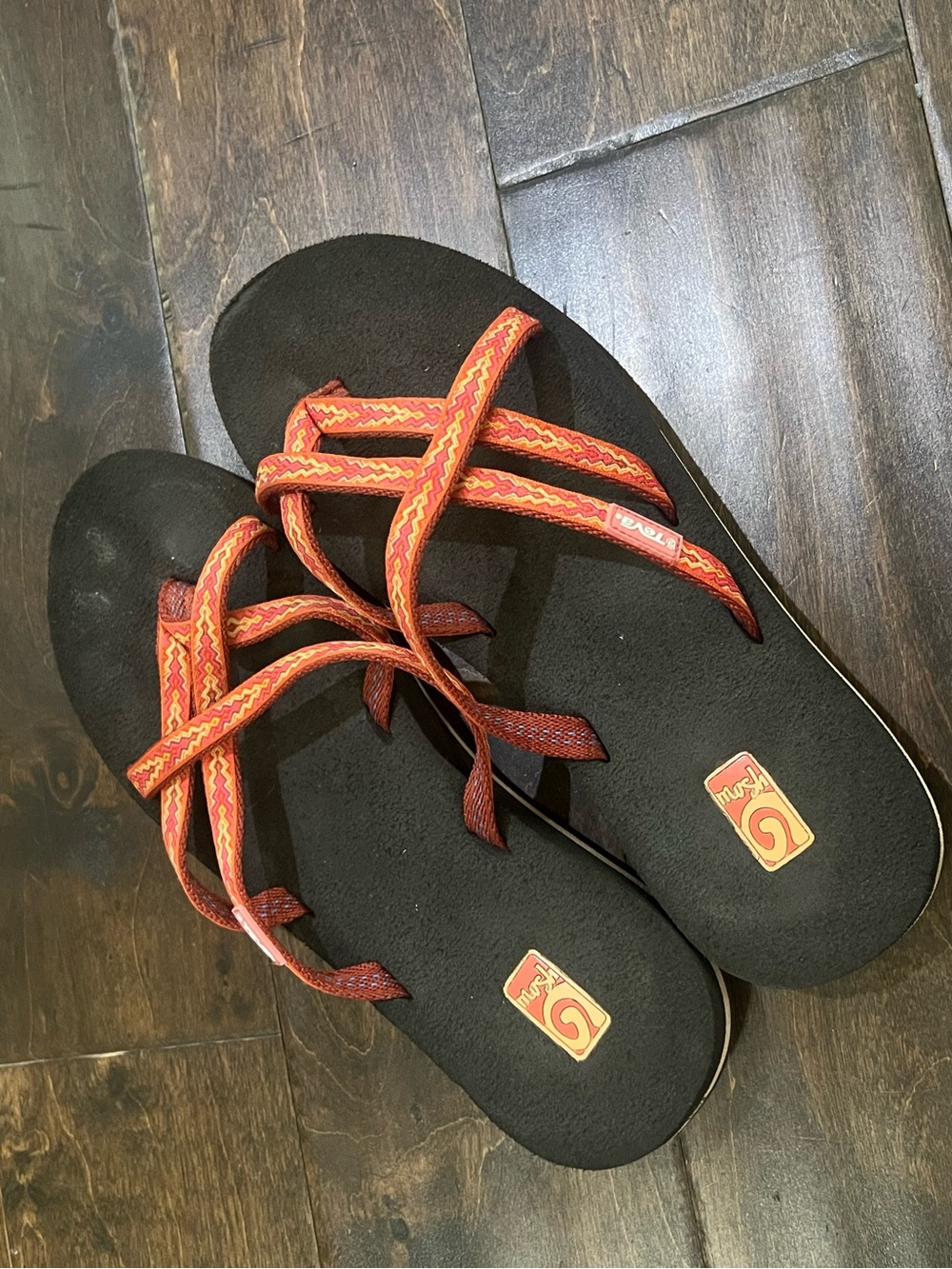 Teva Black Sandals with Orange-Red Patterned Straps